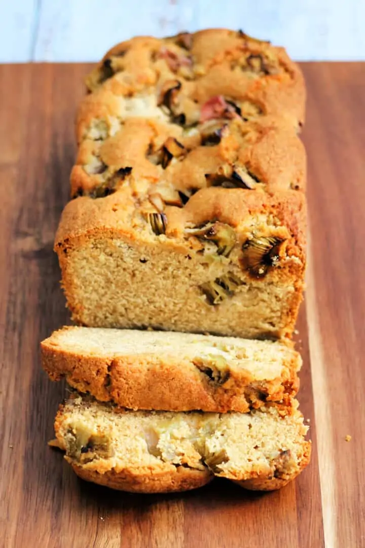 Sliced loaf cake on a wooden board.