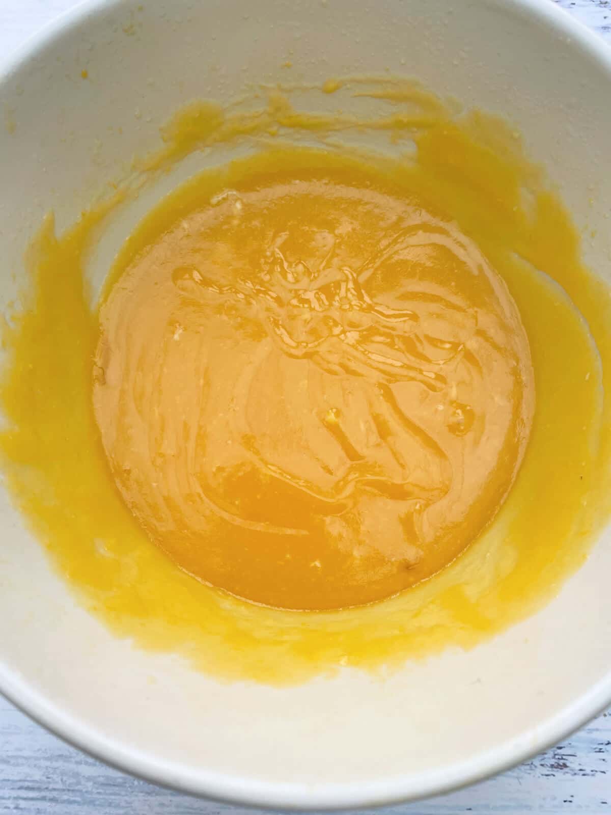 Passionfruit curd or butter thickened up in a bowl.