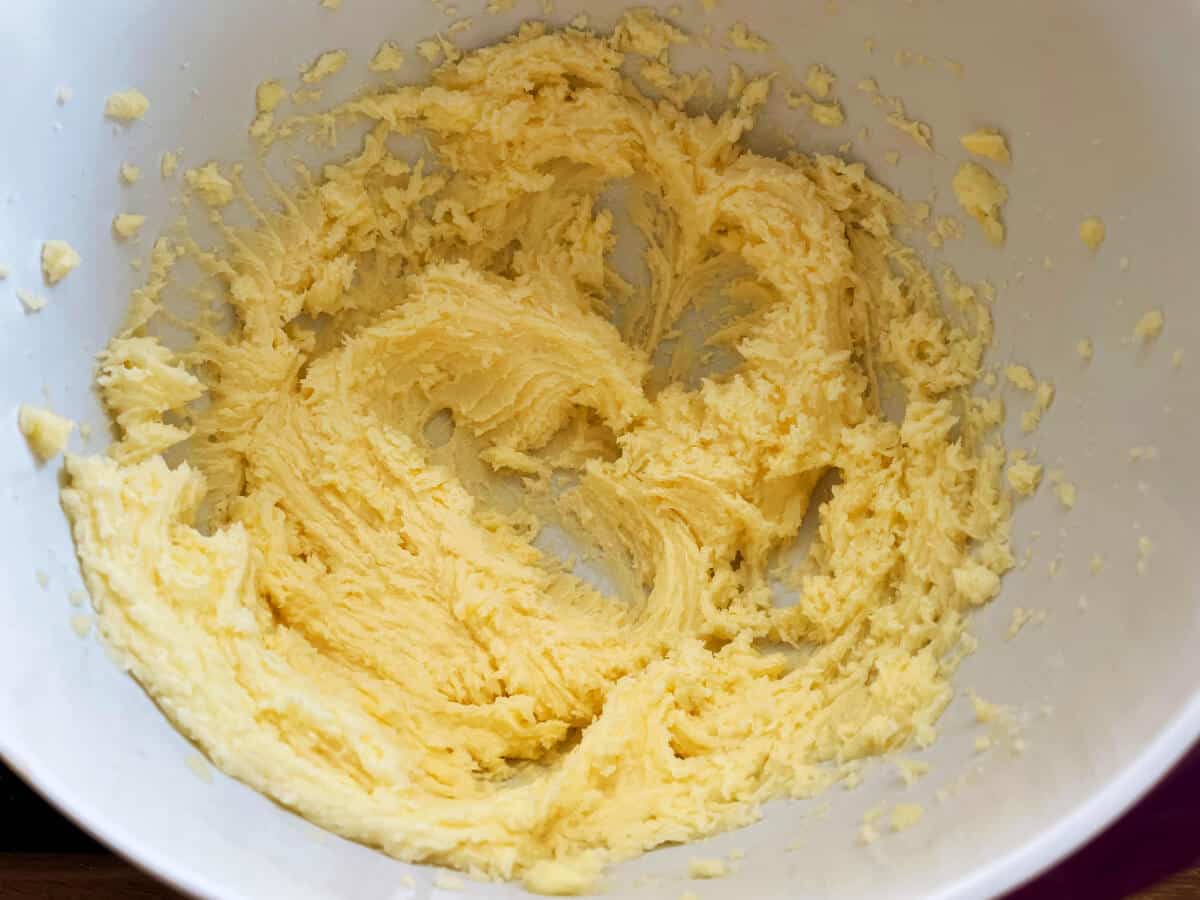 Butter and sugar creamed together, in bowl.