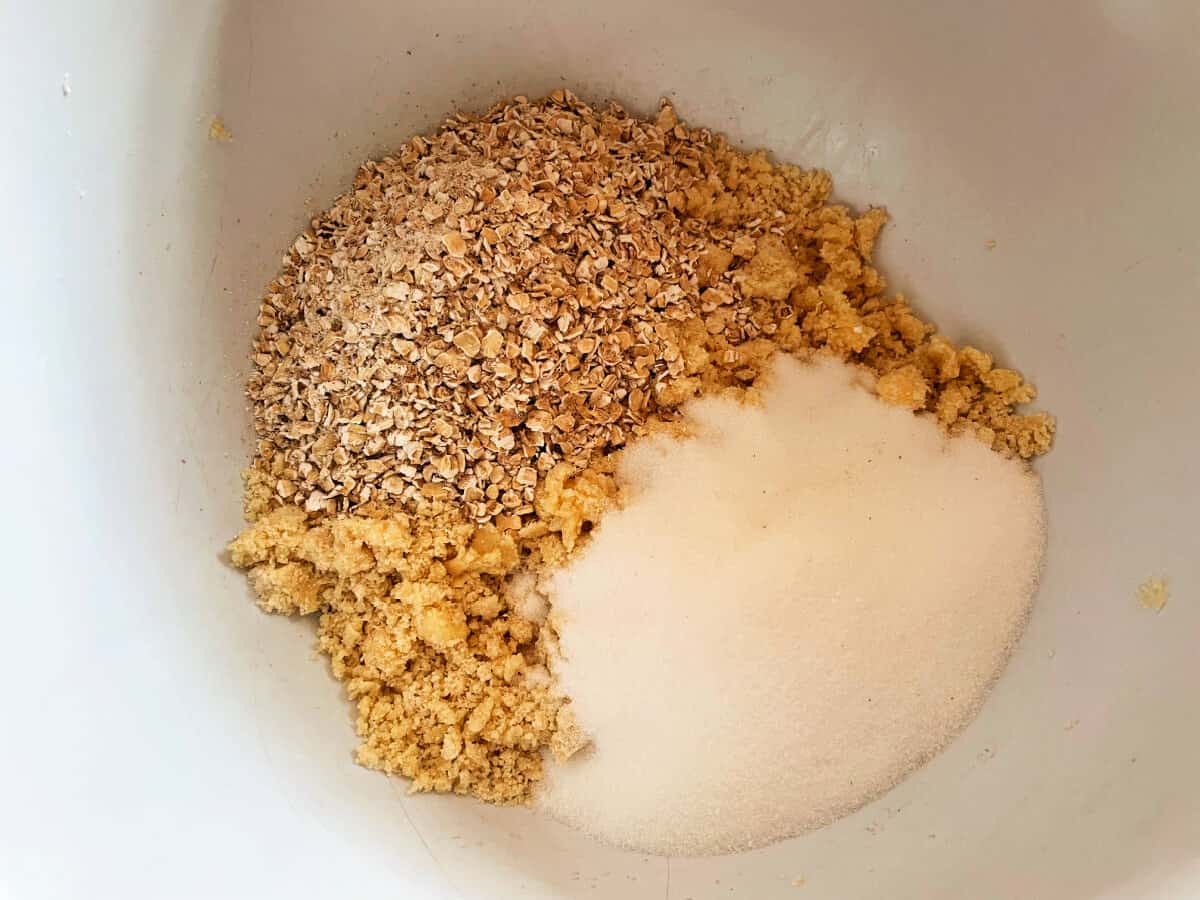 Crumble mix in white bowl, before mixing.