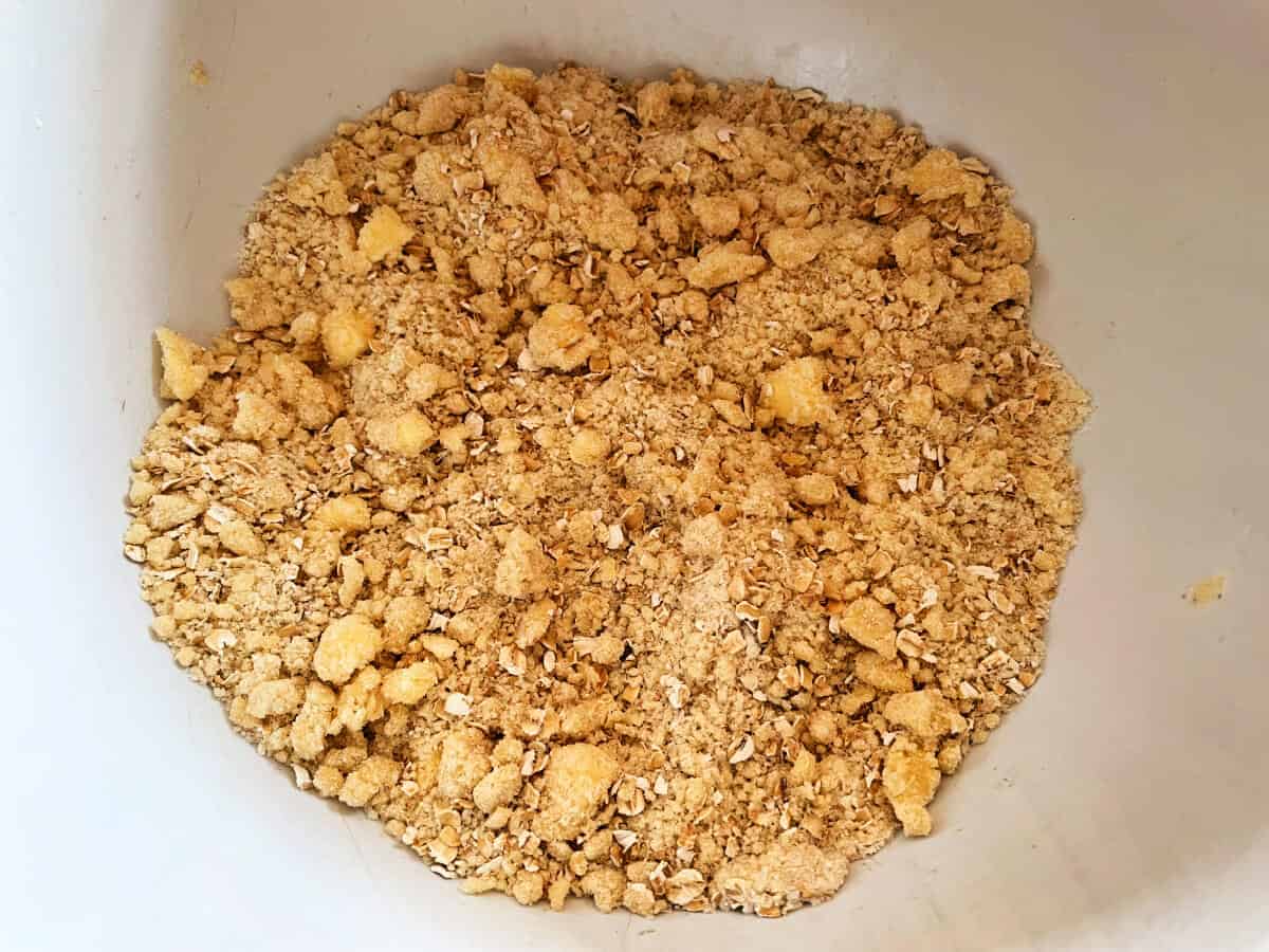 Finished crumble mixture in white bowl.
