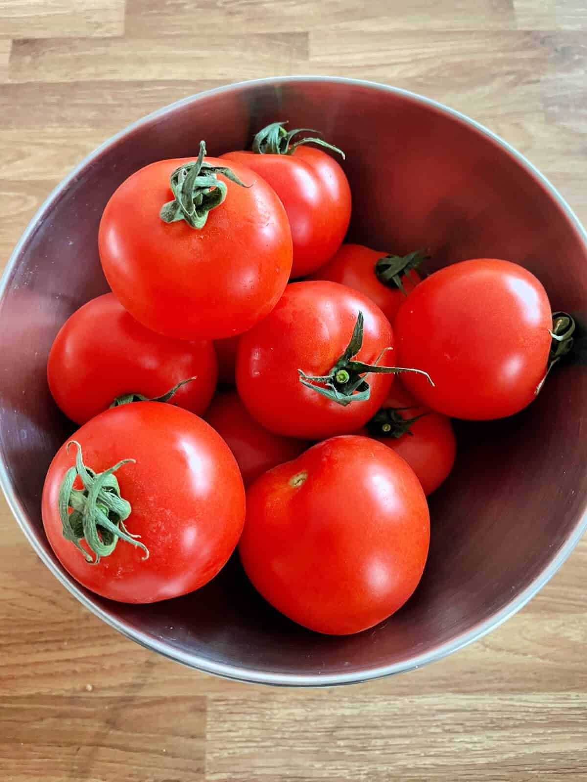 Bowl of vine-ripened tomatoes.