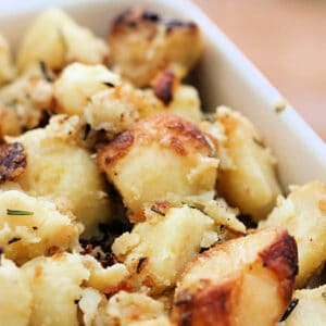 Crispy roast potatoes in close up.