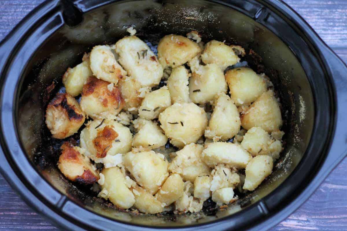 Roast potatoes at end of cooking in slow cooker pot.