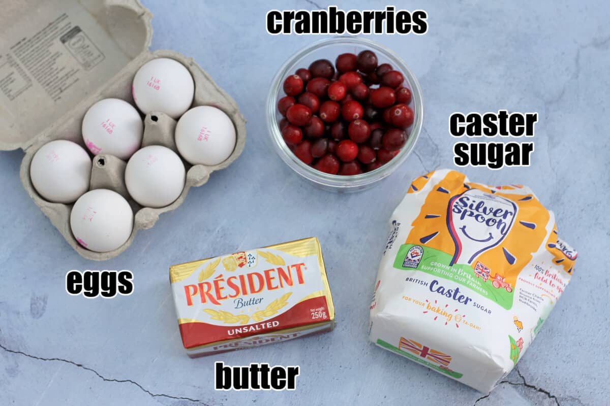 Labelled ingredients for cranberry curd: eggs, cranberries, sugar, butter.