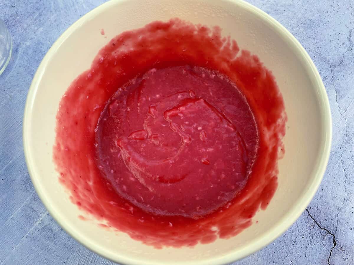 Bowl of cranberry curd, ready to sieve.