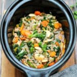 Turkey stew in slow cooker pot.