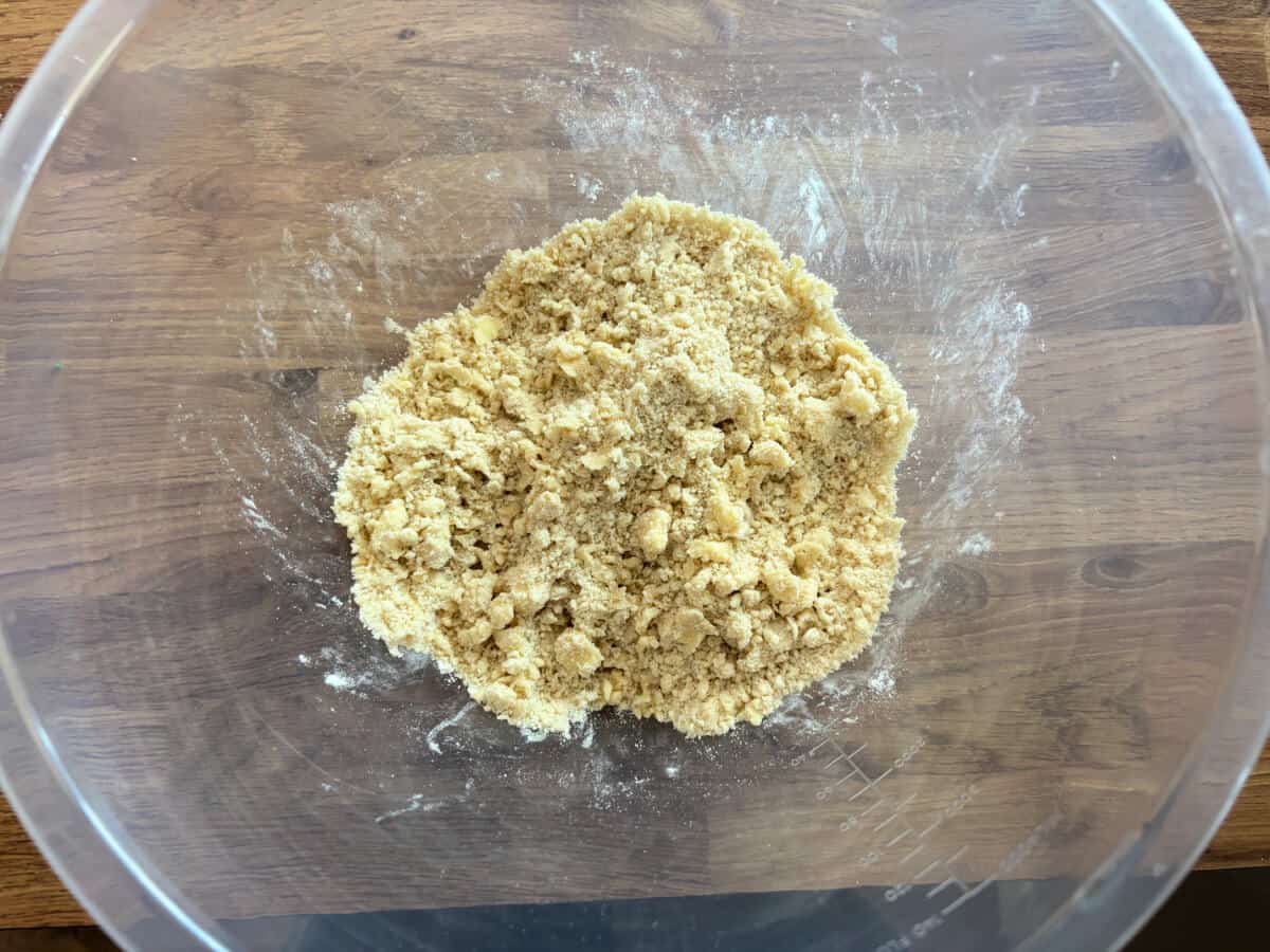 Crumble mixture in bowl, showing medium breadcrumbs texture.