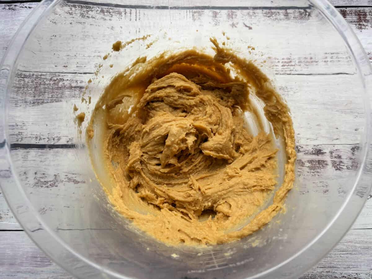 Cake mixture in bowl, after adding the eggs.