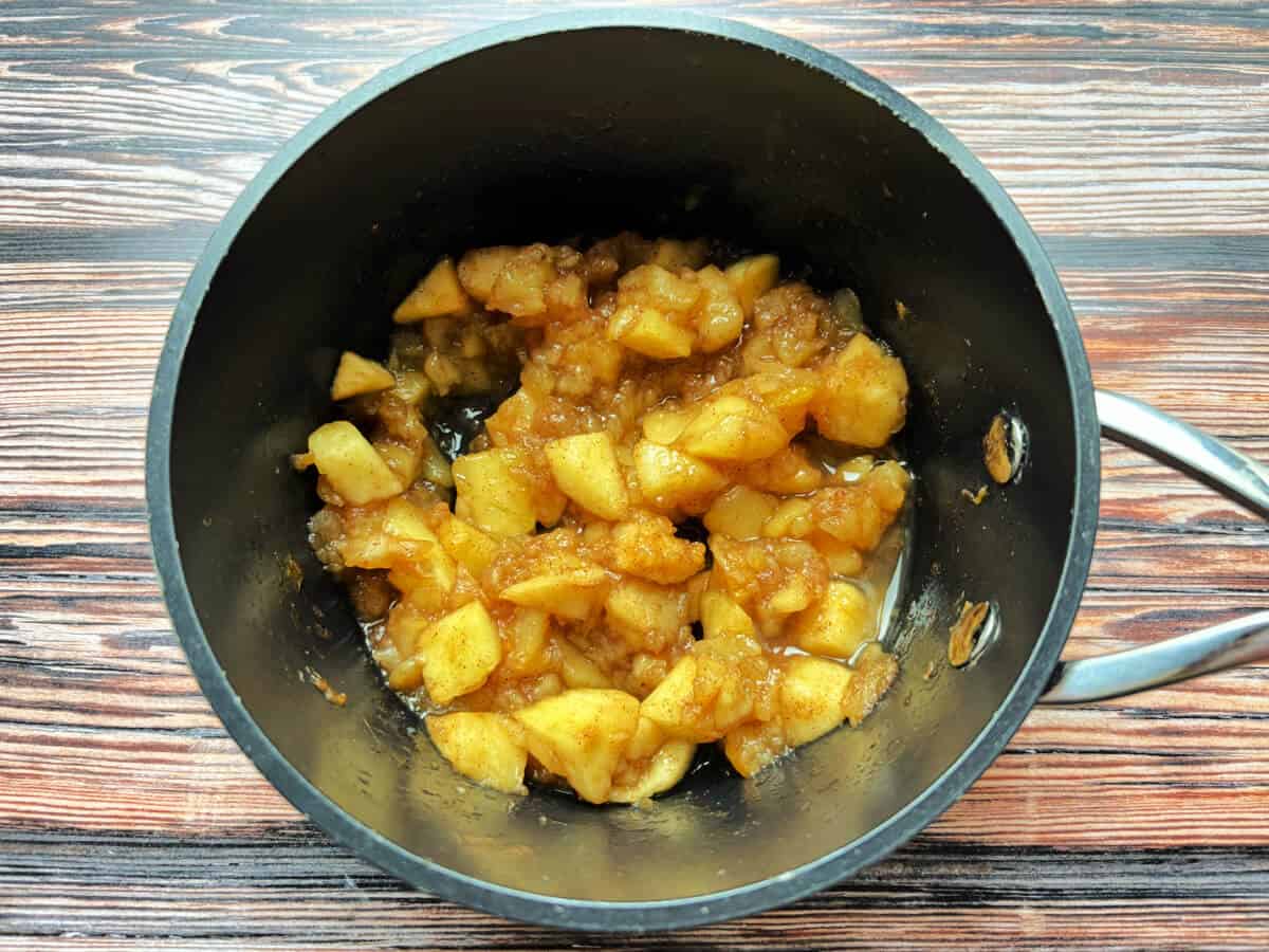 Stewed apple in a saucepan.