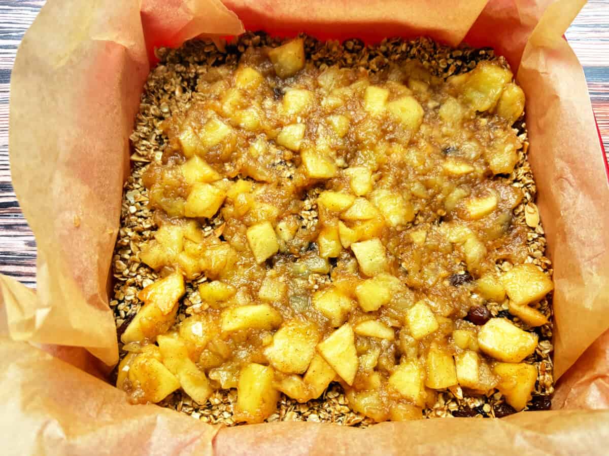 Flapjack mixture topped with stewed apple.