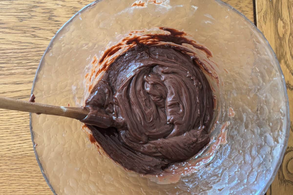 Melted chocolate, butter and golden syrup in bowl.