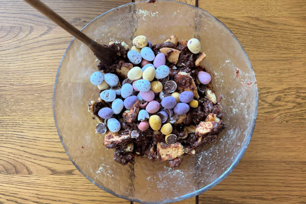 Bowl with mini eggs added to previous ingredients.