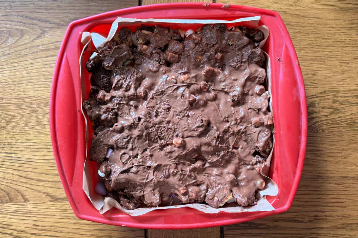 Rocky road with melted chocolate spread on top.