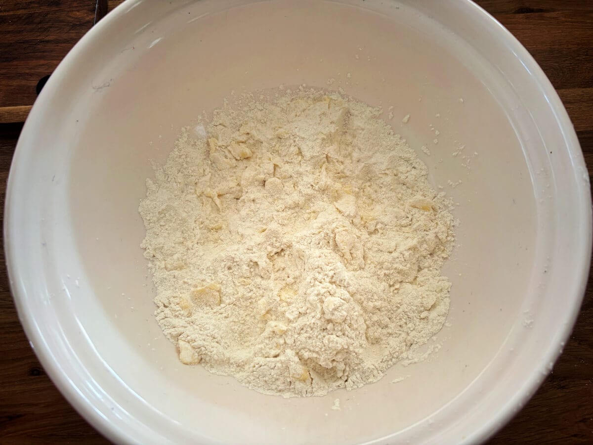 Butter rubbed into flour, breadcrumb texture.