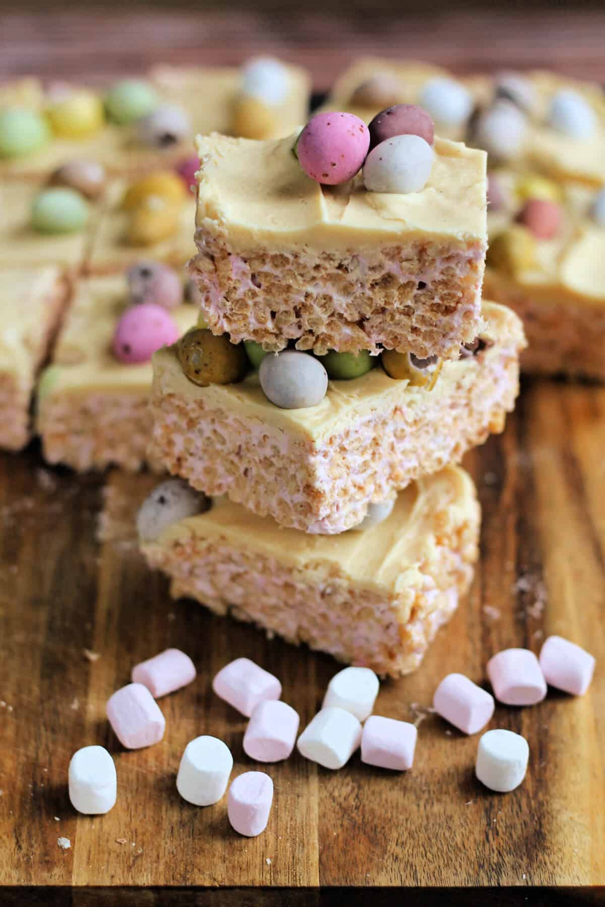 A stack of Rice Krispie squares with mini eggs.