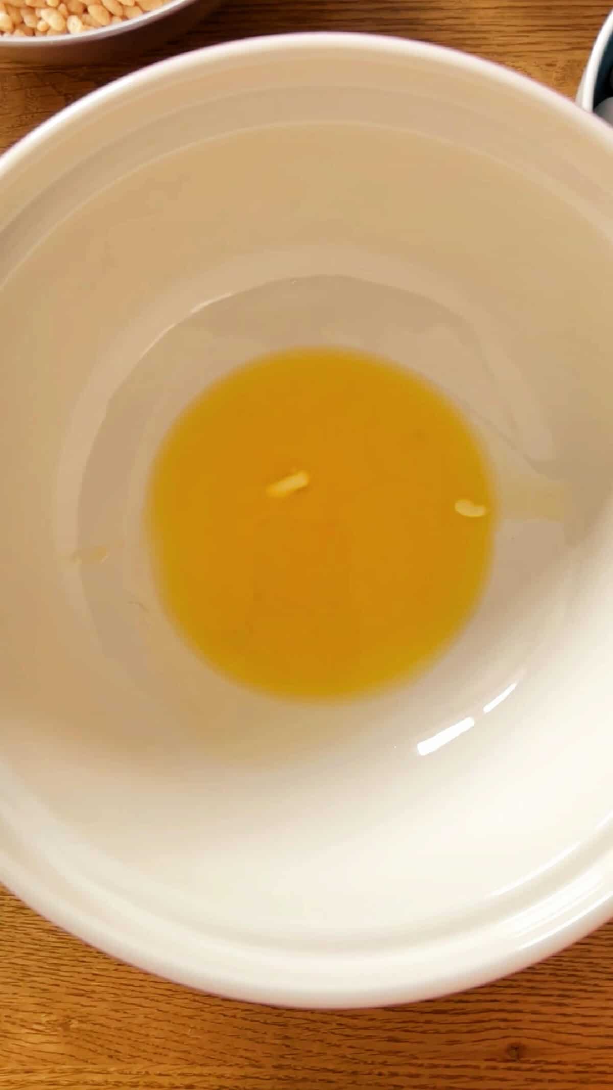 Melted butter in a bowl.