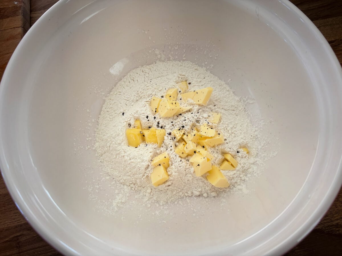 Flour and butter in a bowl.