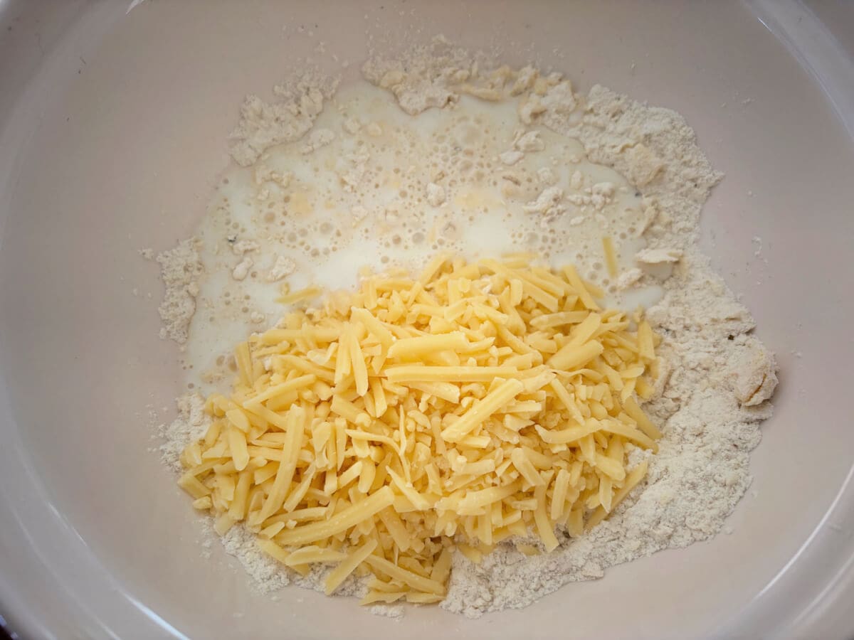 Scone mixture with added milk and cheese.