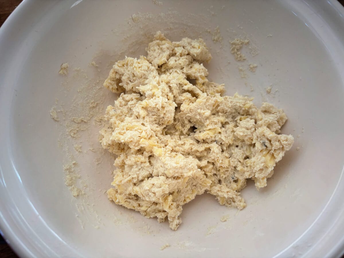 Scone dough brought together in a bowl.