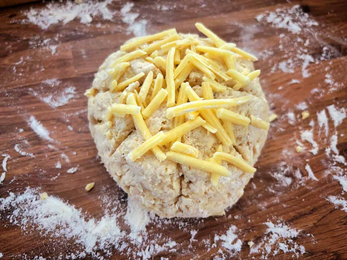 Scone round with extra cheese sprinkled on top.